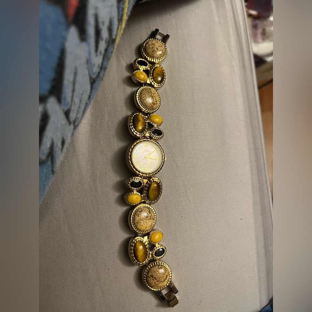 Vintage Aria Watch with various brown and neutral stones with gold tone
